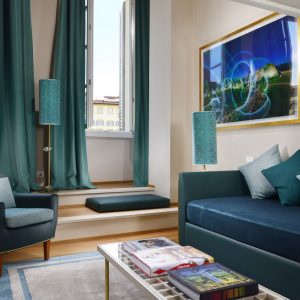 Voyagealitalienne Grand hotel de la Minerva suite petrol green