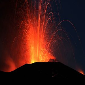 Fire at night. Volcano erupting